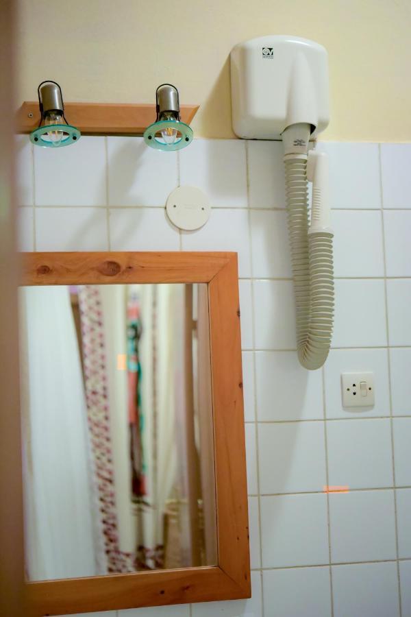 Botanika Hotel Бужумбура Екстериор снимка